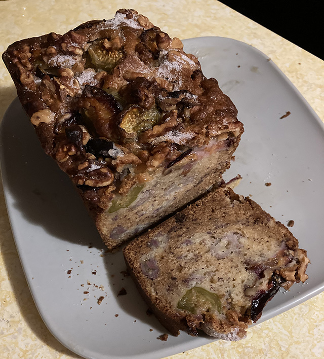 Partial loaf plus a slice of fruit-topped banana bread.